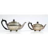 A graduated pair of Regency style silver teapots, one William Hutton & Sons, date letter rubbed,