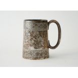 A Victorian silver christening mug, of tapered cylindrical form, with a 'C' shaped handle,