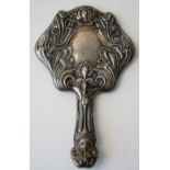 A lady's silver mounted Art Nouveau decorated hand mirror,