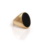 A 9ct gold and black onyx gentleman's signet ring, mounted with a plain oval black onyx,