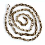 A gold decorated oval link neckchain, detailed 9C fitted with a gold swivel detailed 9C,
