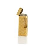 A gold rectangular cased gas lighter, the exterior engine turned and detailed 18 K Italy.