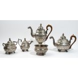 A Portuguese five piece tea and coffee set, comprising; a teapot, a coffee pot, a lidded milk jug,