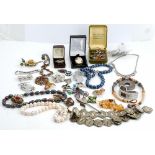 A large collection of silver and costume jewellery,