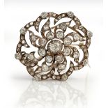 A late 19th/early 20th century diamond set brooch of flowerhead design,