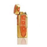A gold mounted coral curved rectangular cased gas lighter, detailed 750,