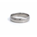 A platinum plain wedding band ring, ring size O 1/2, weight 6.6gms.