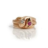 A gold, diamond and ruby ring, designed as two interwoven snakes,