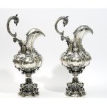 A pair of Portuguese wine ewers, each decorated in the Rococo style,