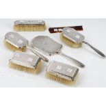 A pair of silver mounted rectangular hairbrushes,