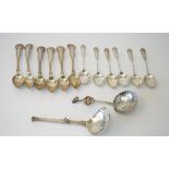 A set of six silver teaspoons, having decorated handles, Sheffield 1911,