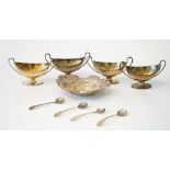 Silver, comprising; a set of four George III twin handled salts, each of oval form,