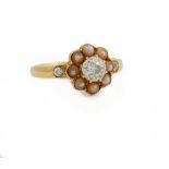A late Victorian gold, diamond and seed pearl ring, of cluster design,