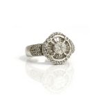 An Iliana 18ct white gold and diamond cluster ring, of shaped circular form,