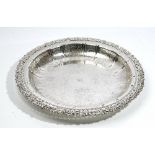 A silver large circular bowl, of shallow form,