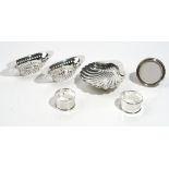 Silver, comprising; a buttershell, Sheffield 1913, two napkin rings,
