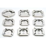 Two pairs of silver ashtrays, each of square form, Birmingham 1978,