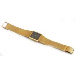 An Eterna 18ct gold rectangular cased gentleman's bracelet wristwatch,