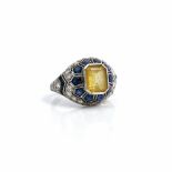 A yellow beryl, sapphire and diamond ring, circa 1930s,