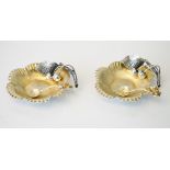 A pair of Italian silver salts, each of cast flowerhead form, lightly gilt,