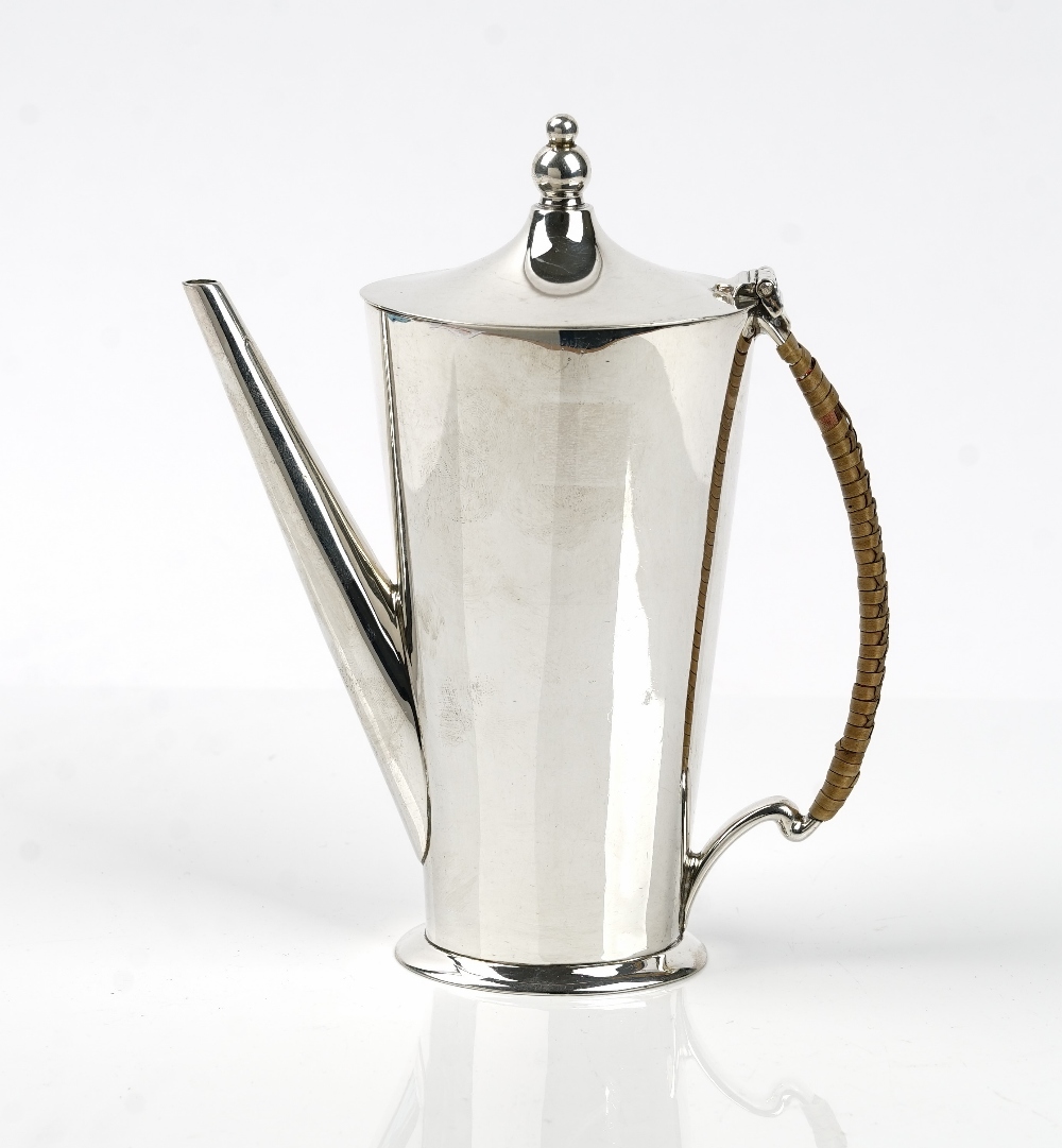 A silver coffee pot of tapered oval form, with a rush woven handle, Sheffield 1937, height 17cm,