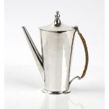 A silver coffee pot of tapered oval form, with a rush woven handle, Sheffield 1937, height 17cm,