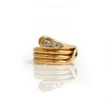 A late Victorian 18ct gold and diamond ring, designed as a coiled snake,