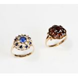 A 9ct gold and garnet set nine stone cluster ring, ring size N and a 9ct gold,