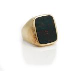 A gold and bloodstone gentleman's signet ring, mounted with a curved rectangular bloodstone,