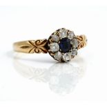 A gold, sapphire and diamond nine stone cluster ring,