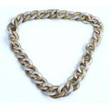 A 9ct gold bi-gold heavy necklace of graduated textured flattened curb link design,
