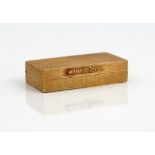 A 9ct gold rectangular hinge lidded pill box, retailed by Dunhill London,