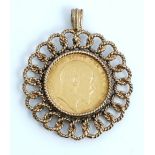 An Edward VII sovereign 1908, in a 9ct gold pendant mount, decorated with a ropetwist border,