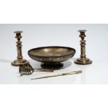 A silver circular bowl, with a decorated rim, raised on a plain circular foot, diameter 29cm,