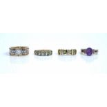 A gold and colourless gem set ring, detailed Balkan 585, a gold, amethyst and diamond set ring,