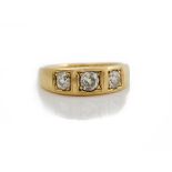 An 18ct gold and diamond set ring, of tapered design,