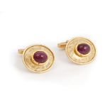 A pair of 9ct gold and cabochon ruby dress cufflinks,