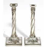 A matched pair of George III silver candlesticks, one by John Parsons & Co, Sheffield 1791,