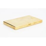 A gold rectangular visiting cards case, having a textured finish, two sprung clip fittings within,