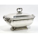 A George III silver twin handled tureen and cover, of curved rectangular form,