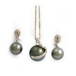 A 9ct white gold, grey tinted Tahitian cultured pearl and diamond set pendant,