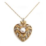 A 9ct gold, diamond and cultured pearl pendant, in a heart shaped design,