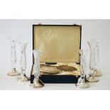 A lady's silver mounted hairbrush and mirror set, with embossed decoration,