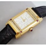 A Jaeger-Le Coultre Reverso 18ct gold, diamond and ruby set dress wristwatch,