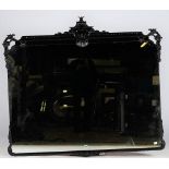 An overmantel mirror, the black lacquered frame with foliate ornament, in Chinese Chippendale style,