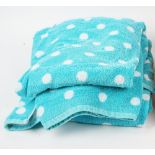A collection of blue and white spotted towels (qty).