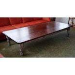 A custom made 'Vermont' cocktail table, the rectangular stained pine top,