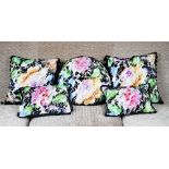 Two pairs of black silk and cut-velvet cushions,