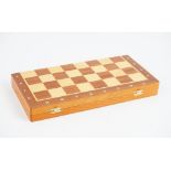 A contemporary turned and carved wooden chess set, one half natural,