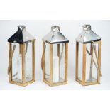 A chromium plated folding candle holder,